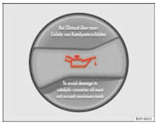 Dans le compartimentmoteur : bouchon de l'orifice de remplissage d'huile-moteur