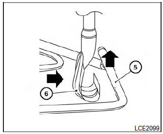 Réinstallation de la roue de secours à usage temporaire à son emplacement d'origine